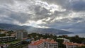 Majestic Madeira: Funchal's Cityscape Framed by Mountains and Clouds Royalty Free Stock Photo