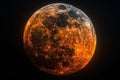 Breathtaking  a red moon in the night sky, resembling an eclipse. the background is black and the scene captures just one hal Royalty Free Stock Photo