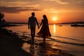 Breathtaking Romantic Sunset. Silhouettes of a Loving Couple Holding Hands in Serene Nature Scene Royalty Free Stock Photo