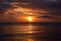 Breathtaking scene of the sunset in the cloudy sky over the ocean - perfect for a wallpaper