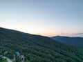 Breathtaking scenery of the sunset on forest hills in Ludlow Vermont