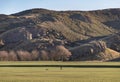 The breathtaking scenic landscape of Holyrood park with Salisbury Crags rugged hills and sky background