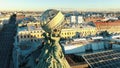 Breathtaking sculpture on rooftop close round aerial motion