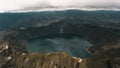 Breathtaking shot of the Quilotoa Volcano and Lake Crater under the cloudy sky Royalty Free Stock Photo