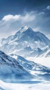 A breathtaking snowy peak rises into the clear sky, its slopes a blend of harsh rock and soft snow drifts, embodying Royalty Free Stock Photo