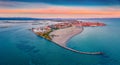 Breathtaking summer view from flying drone of public beach of Grado port, small town located between Venice and Trieste