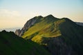 Breathtaking sunset in the mountains. View of the Bockmattli Innerthal and Lake Zurich. Hiking in Switzerland. Glarus