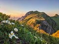 Breathtaking sunset in the mountains. View of the Bockmattli Innerthal and Lake Zurich. Hiking in Switzerland. Glarus