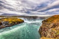 Breathtaking sunset scene of powerful Godafoss waterfall. Dramatic sky over Godafoss Royalty Free Stock Photo