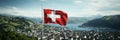 Breathtaking swiss mountain range with the iconic flag of switzerland proudly waving in the wind