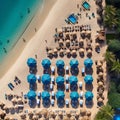 umbrellas and sunbeds top view the sandy beach