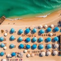 umbrellas and sunbeds top view the sandy beach