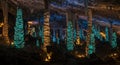 Spectacular illuminated cave formations glow turquoise Royalty Free Stock Photo