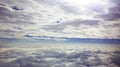 breathtaking view of flying between two layers of clouds like floating in heaven Royalty Free Stock Photo