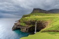 Breathtaking view of the iconic MÃÂºlafossur waterfall on Vagar Island, Faroe Islands Royalty Free Stock Photo