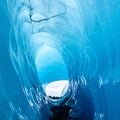 Journey Through a Blue Glacial Ice Cave Royalty Free Stock Photo