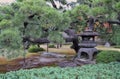 Breathtaking view on japanese garden in autumn. Beautiful traditional stone japanese lantern in foreground