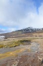 Breathtaking view of the landscape surrounding a steaming geysir Royalty Free Stock Photo