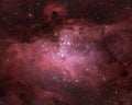 Breathtaking view of light red and pink Eagle Nebula in the constellation Serpens