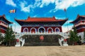 Breathtaking view of Medicine Buddha old temple in Jingpo lake geopark with azure sky