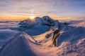 Breathtaking view of the mountains peaks covered in snow under at sunset in High Tatras Slovakia Royalty Free Stock Photo