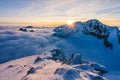 Breathtaking view of the mountains peaks covered in snow under at sunset in High Tatras Slovakia Royalty Free Stock Photo