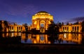 Breathtaking view of the Palace of Fine Arts in San Francisco at night with bright orange lights Royalty Free Stock Photo