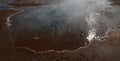 Breathtaking landscape of a steaming geysir in Iceland Royalty Free Stock Photo