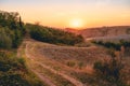 Breathtaking view of the tiny serpent road at sunset Royalty Free Stock Photo