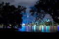 the skyline of toronto lit up at night, with the river below it Royalty Free Stock Photo