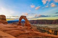 Breathtaking vista of the iconic Delicate Arch in Utah at sunset.