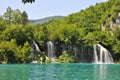 Breathtaking waterfalls panorama in Plitvice Lakes National Park, Croatia, Europe. Majestic view with turquoise water and sunset Royalty Free Stock Photo