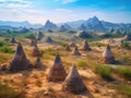 Pastel mountain landscape with golden pyramids