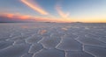 Dramatic salt flat sunset over geometric patterns Royalty Free Stock Photo