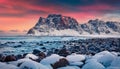 Breathtaking winter sunrise on Haukland Beach, Vastvagoy