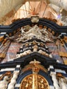 A breathtaking zoom on a sculpture group of saints in one of the magnificent catholic flemish cathedrals Royalty Free Stock Photo