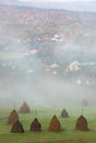 breb maramures in autumn fog traditional Romanian village