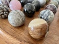 Brecciated Jasper multicolored polished crystal sphere with other various semiprecious stone balls for meditation