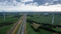 Brecht, Belgium, 6th of July, 2022, Panoramic aerial drone view of wind farm or wind park, with high wind turbines for