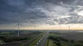 Brecht, Belgium, 16th of may, 2022, Motorway with cars and trucks in line in a traffic jam and the railroad next to it Royalty Free Stock Photo