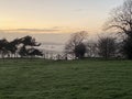 Brede Valley with mist fog a stretch of Sussex countryside near Rye, and Winchelsea. Where Romney and Walland marshland extends Royalty Free Stock Photo