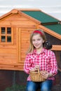 Breeder hens kid girl rancher farmer with chicks in chicken coop Royalty Free Stock Photo