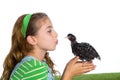 Breeder hens kid girl rancher farmer kissing a chicken chick