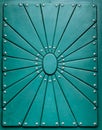 Panel of a green ornamented front door