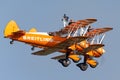 Breitling Wing walkers barnstorming flying display in vintage Boeing Stearman biplanes Royalty Free Stock Photo