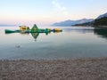 Brela, Croatia - July 24, 2021: Inflatable aquapark on the Loznica beach in a seaside resort. A quiet morning on the Adriatic. Royalty Free Stock Photo