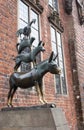 Bremen, Germany - 06/13/2019: famous sculpture of Bremen musicians. Bronze monument of fairytale animals. Grimm brothers heritage.