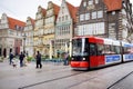 BREMEN, GERMANY - MARCH 23, 2016: Tram stopping by historic houses on the Market Square Royalty Free Stock Photo