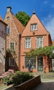 Colorful red houses in the historic Schnoor district in Bremen on a sunny summer day