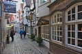 Bremen, Germany - November 23rd, 2017 - Narrow cobblestone street in the historic Schnoor district with restaurants and shops